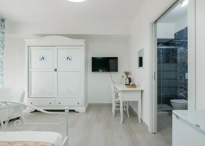 Maison d'hôtes Sa Domu Colorada- Eleganza E Comfort Nel Centro Di