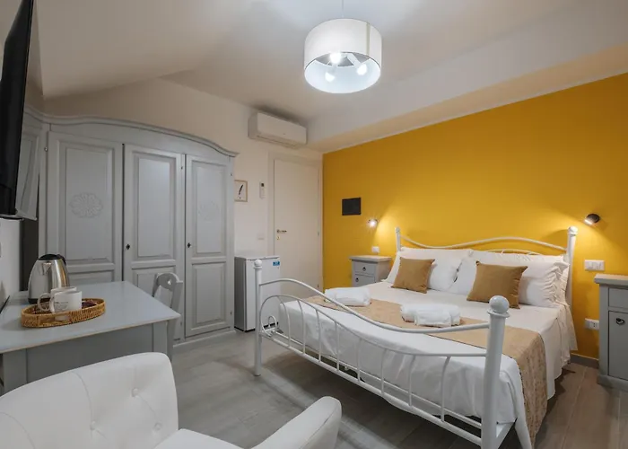 Maison d'hôtes Sa Domu Colorada- Eleganza E Comfort Nel Centro Di